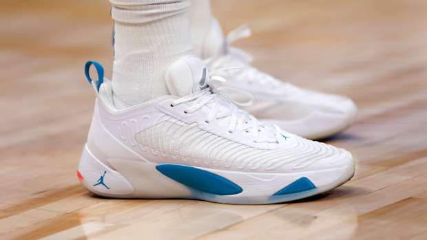 White and blue Jordan Luka 1 shoes.